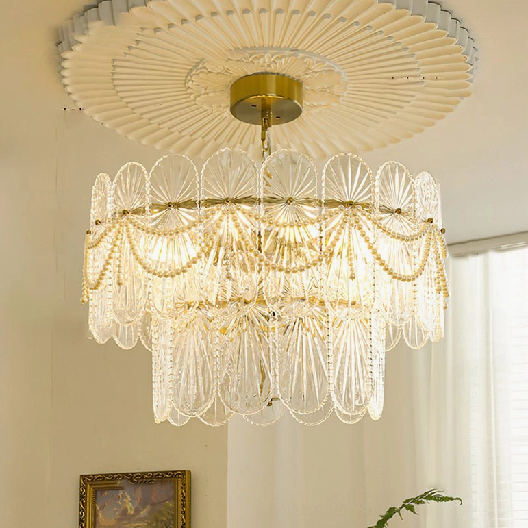 10-light statement art deco chandelier with scalloped glass panels and pearl accents in large dining space