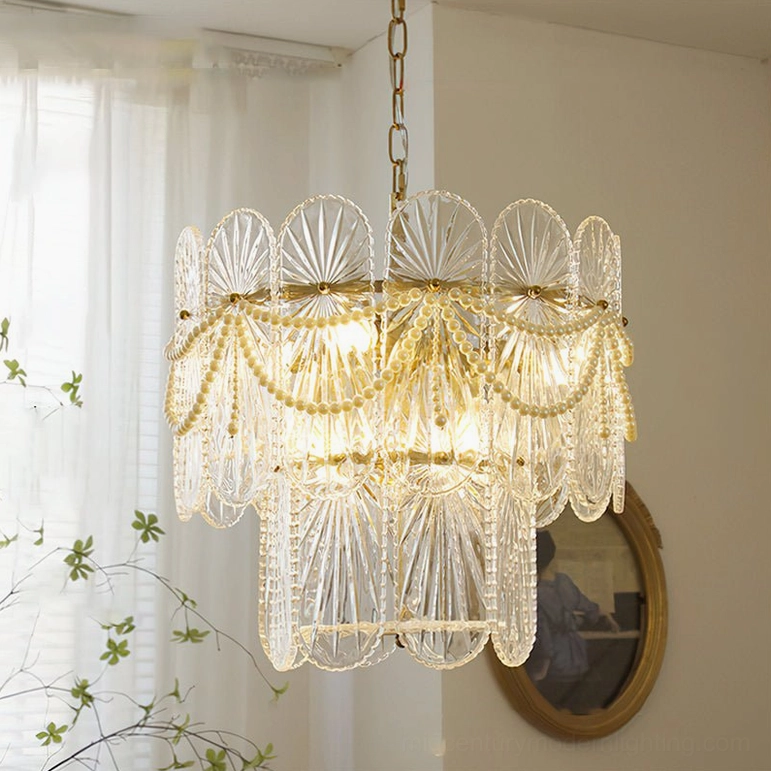 6-light tiered glass chandelier with layered fluted shades and gold beaded trim in bedroom interior