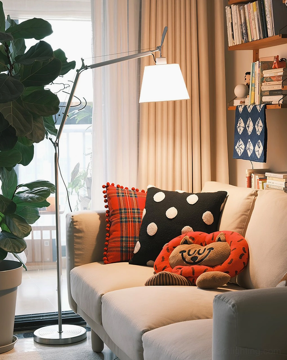 Adjustable swing arm floor lamp with sculptural metal arm, contemporary minimalist design aesthetic