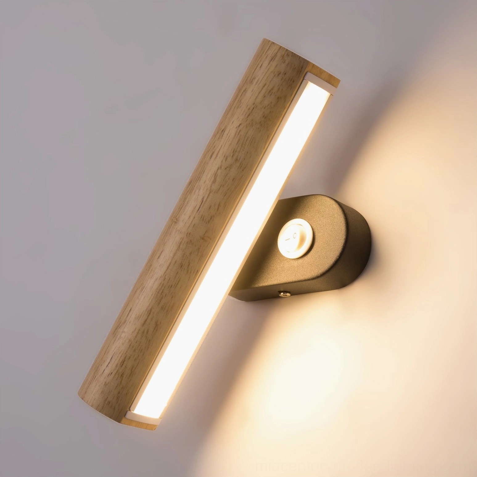 Adjustable rotatable wooden wall lamp showing long LED light strip and rotatable tube body, oblique front view