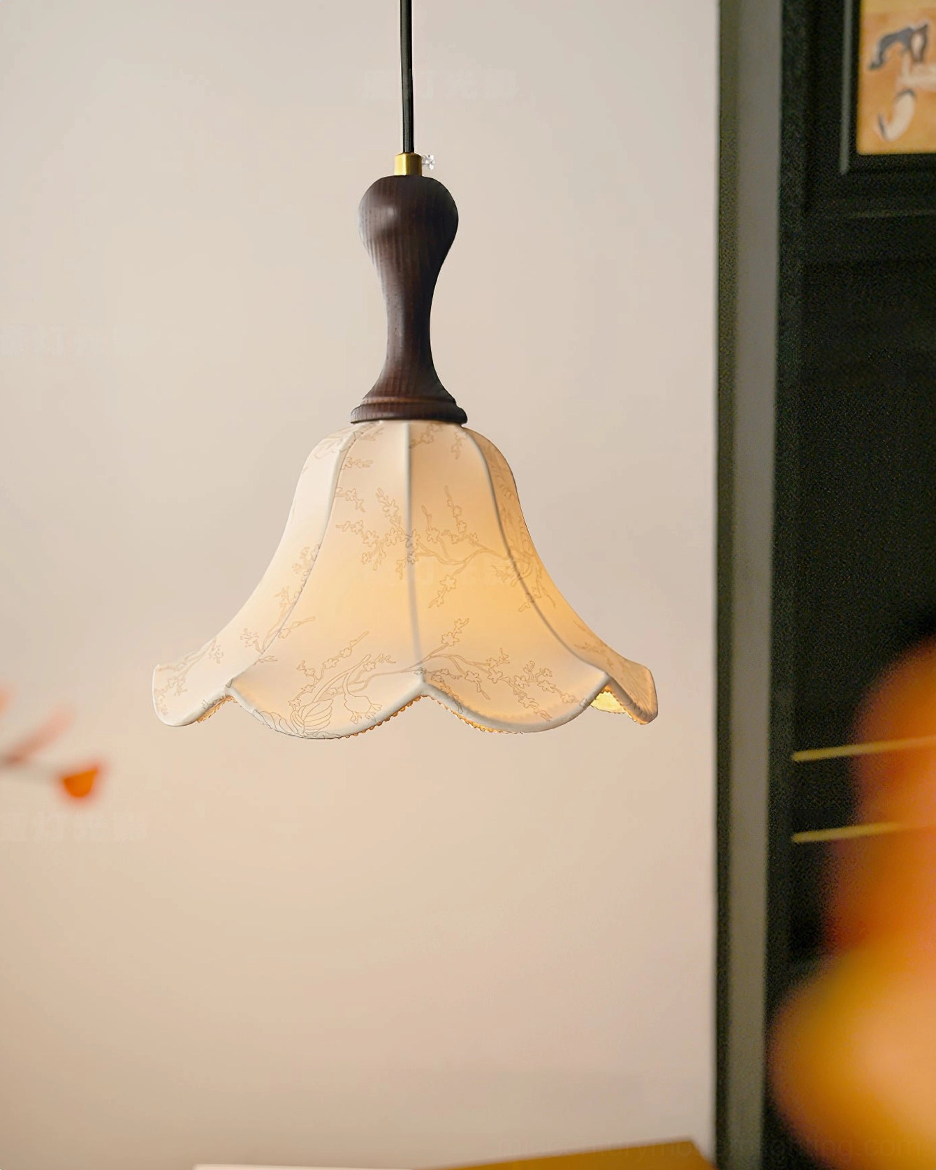 Agnes mid-century modern pendant light with scalloped flower shade in bedroom corner setting