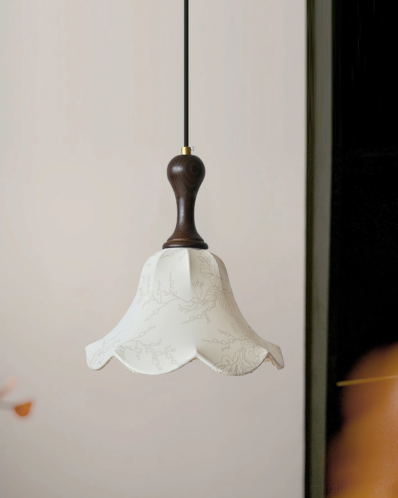 Close-up side view of Agnes pendant light showing floral printed fabric and black suspension cord