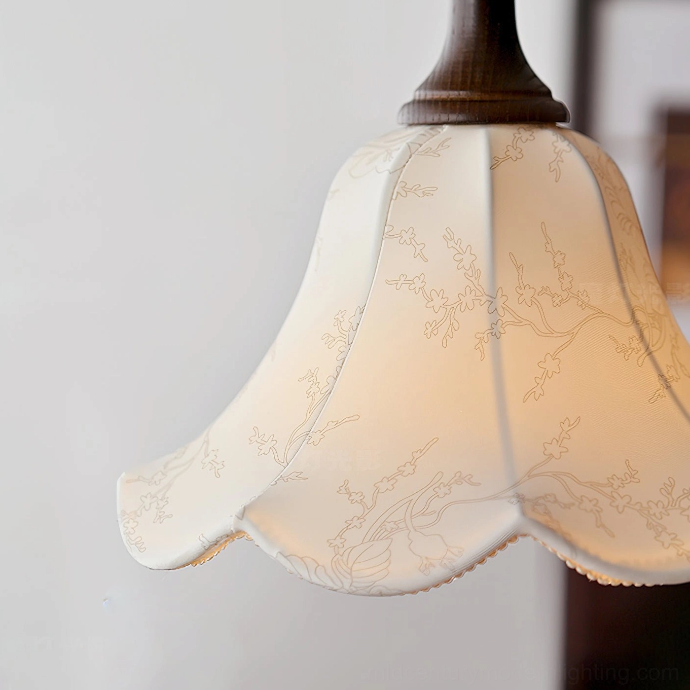 Agnes pendant light casting warm atmospheric lighting in contemporary home interior