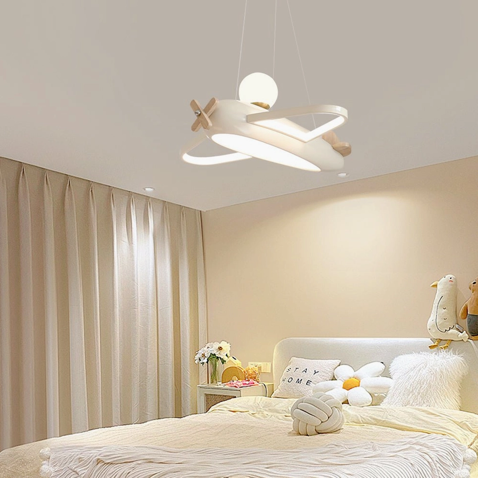 Aircraft pendant lamp providing soft ambient light in minimalist kids bedroom