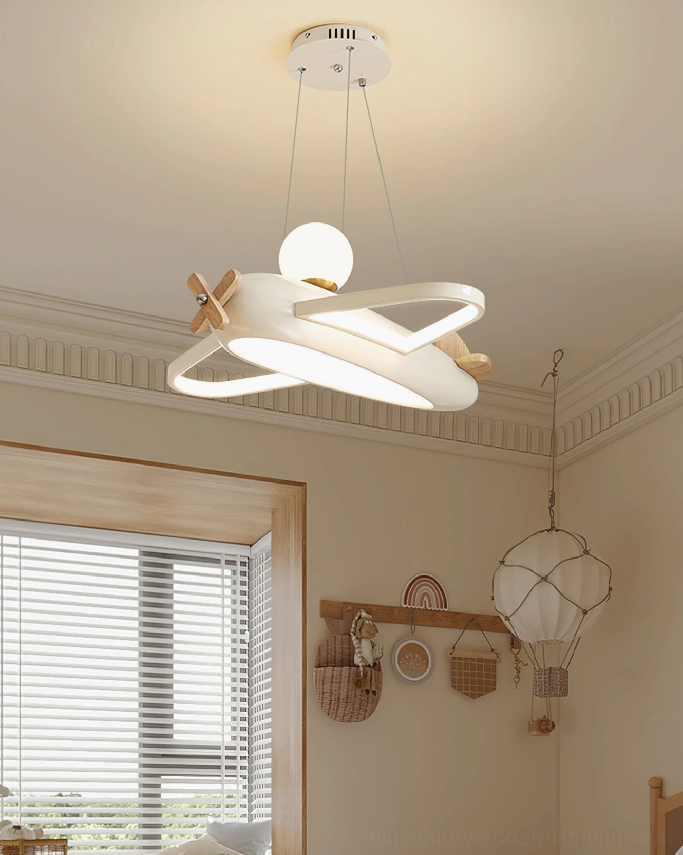 Aircraft pendant lamp warm light glow creating ambient atmosphere in bedroom