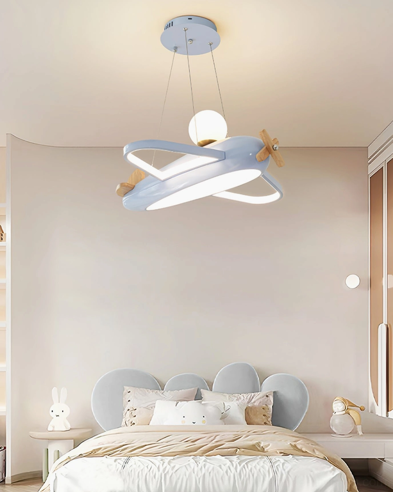 Aircraft pendant lamp showing wooden elements and metal fuselage construction