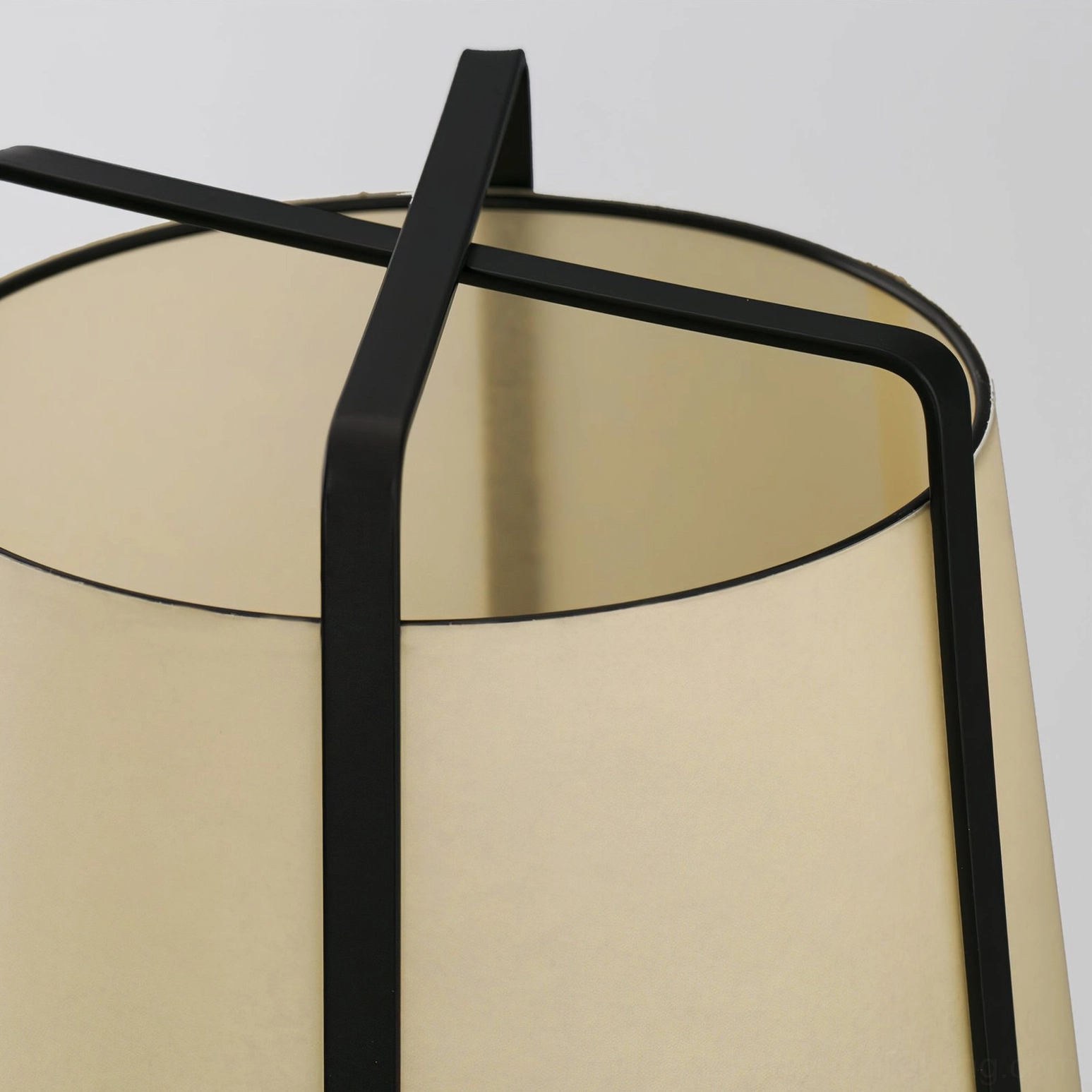 Small Akane table lamp on compact shelf creating intimate accent lighting in tight space