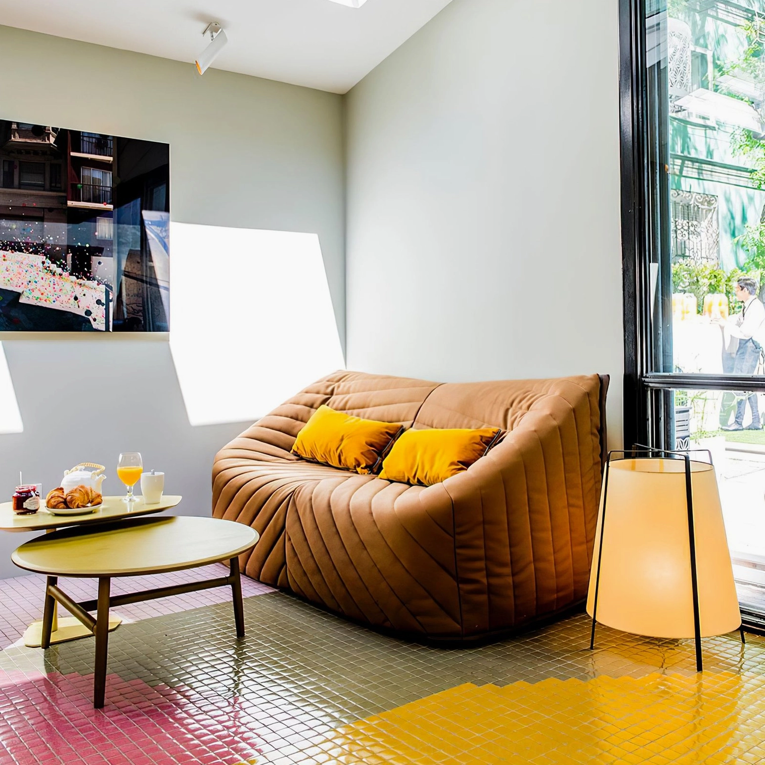 Akane table lamp with warm color temperature LED bulb in reading corner setup