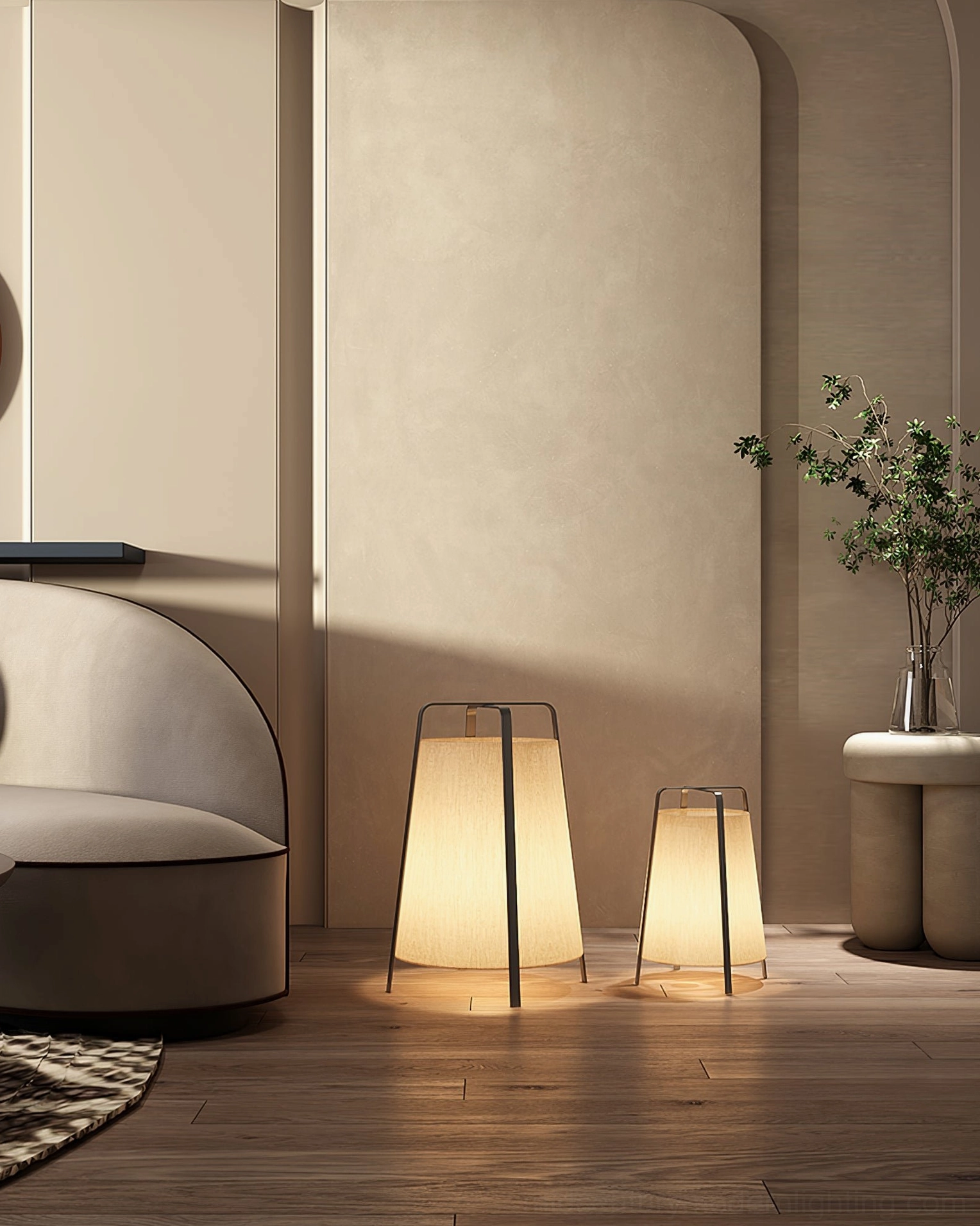 Two Akane table lamps in minimalist lounge area with potted plant and neutral decor, eye-level side view warm lighting