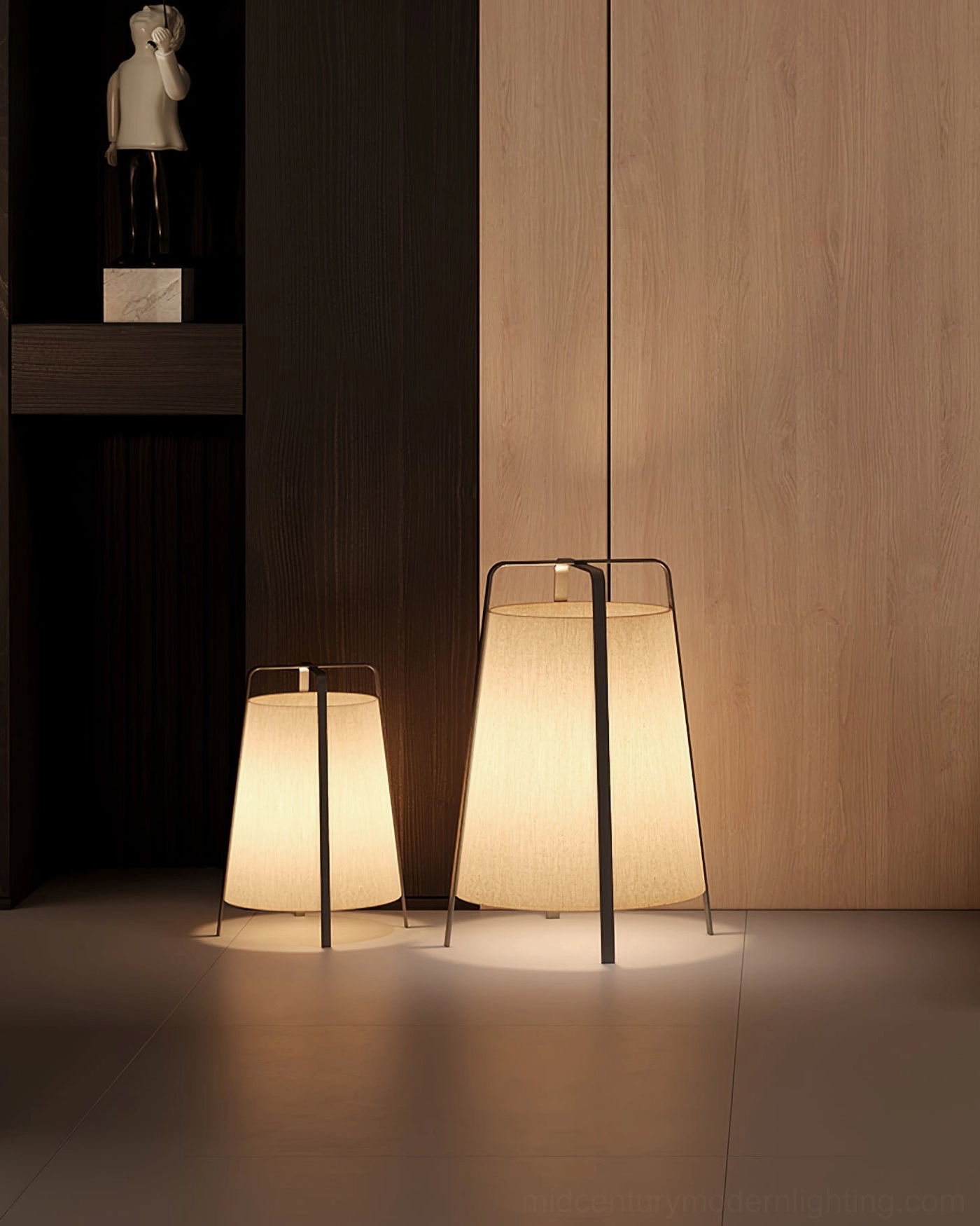 Two size-matched Akane table lamps in dark modern living room with wooden wall shelf, warm glowing display