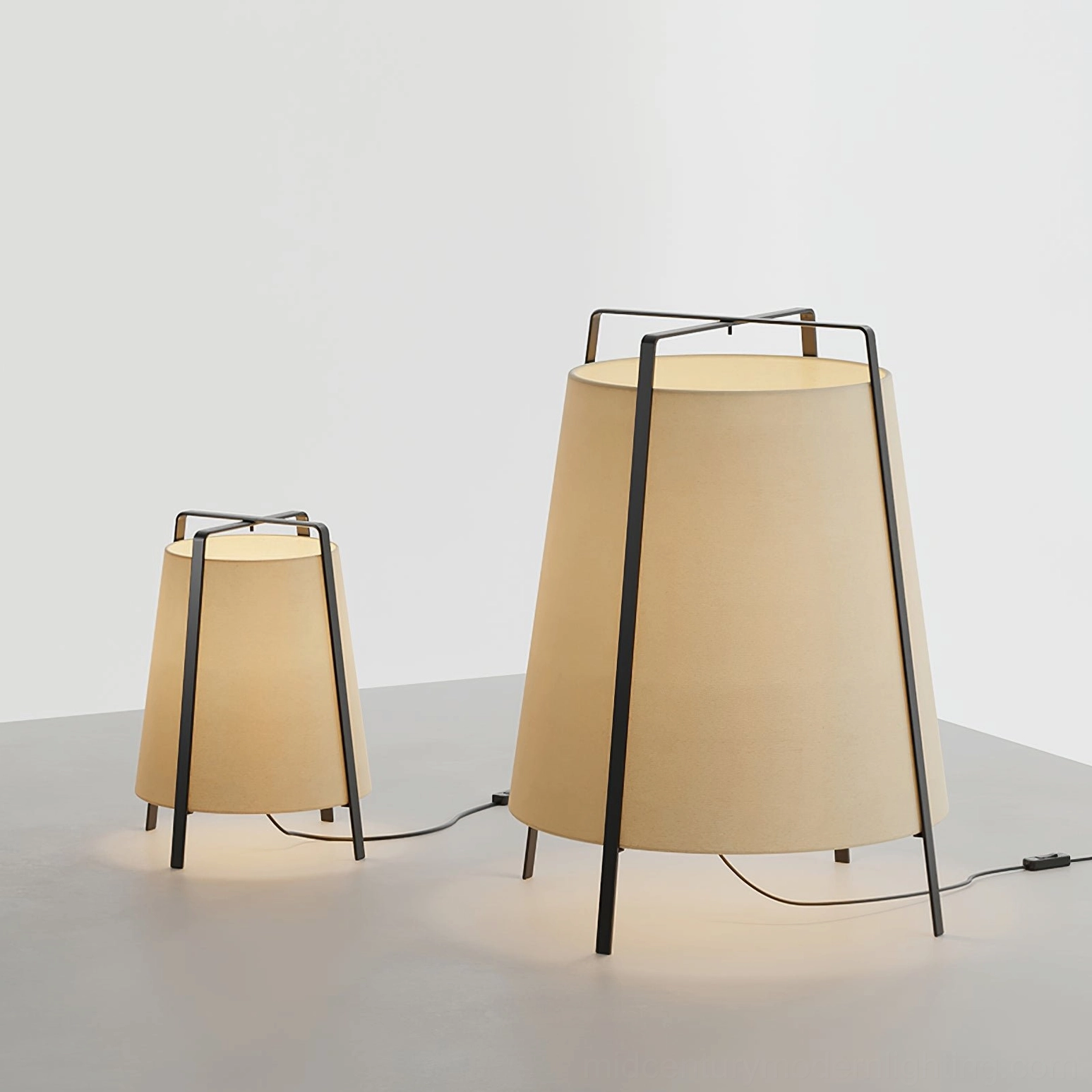 Pair of different-sized Akane table lamps showing versatility of small and large dimensions