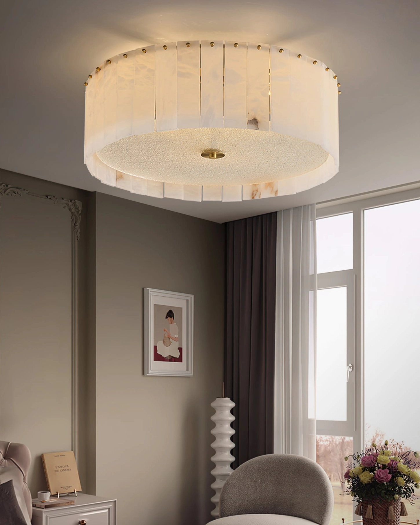 Alabaster drum ceiling light installed in modern bedroom with large window, contemporary home decor