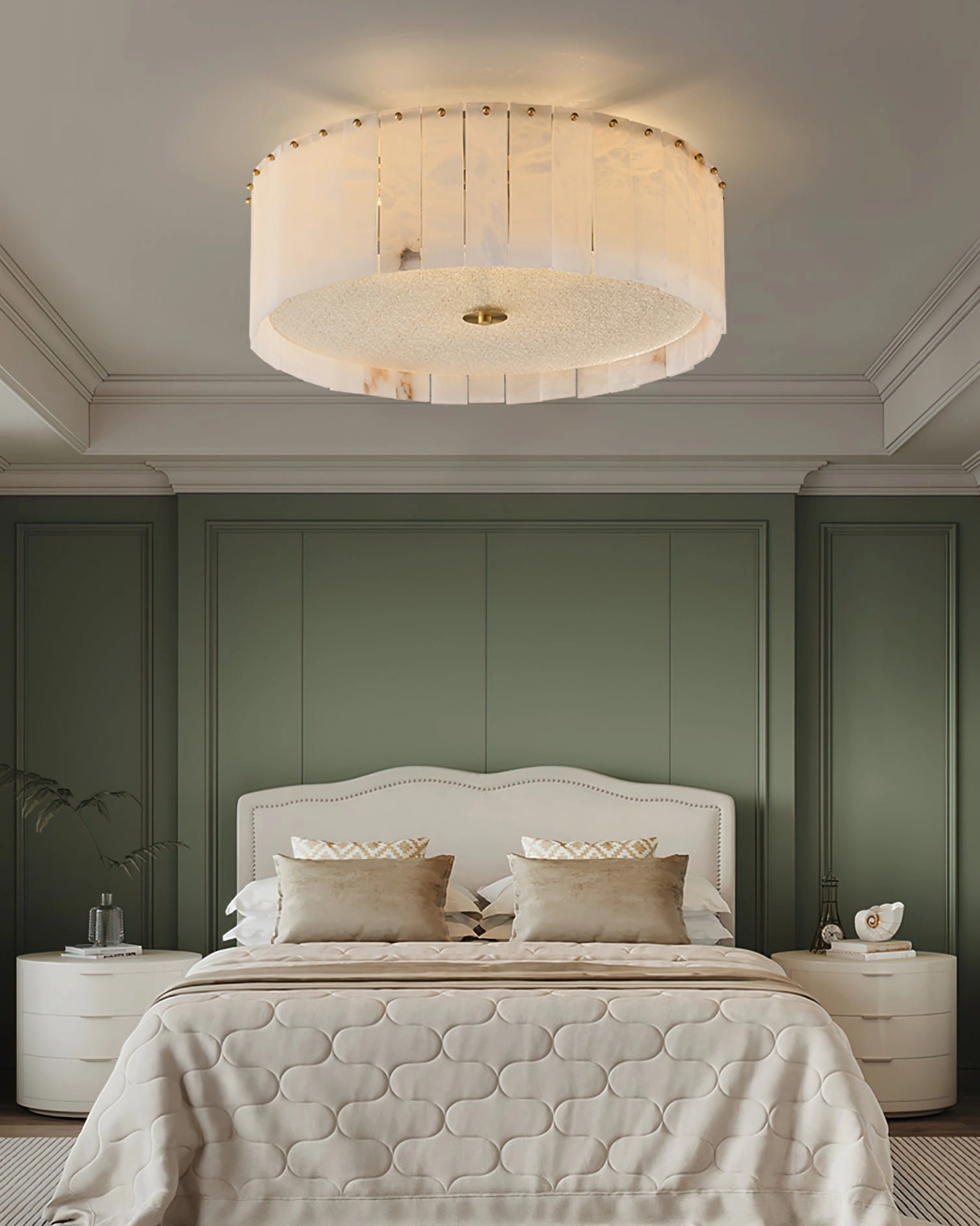 Mid-century alabaster drum light in bedroom with green paneled walls and neutral bedding