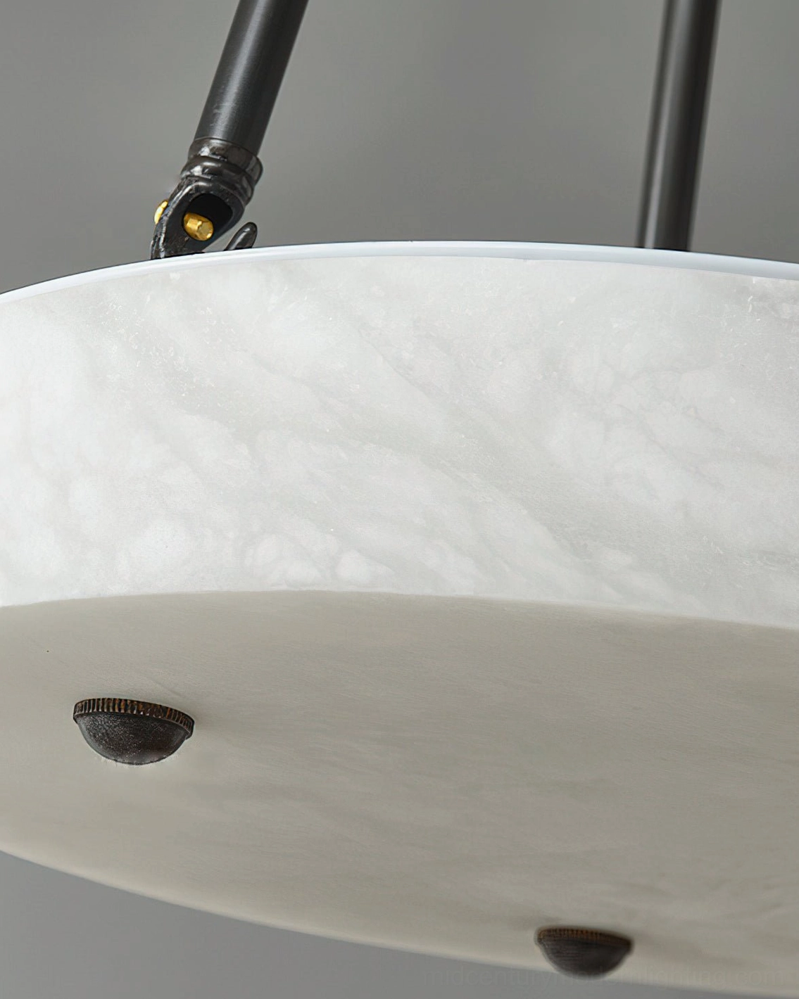 Natural alabaster stone texture detail showing marble grain veining and screw mounting