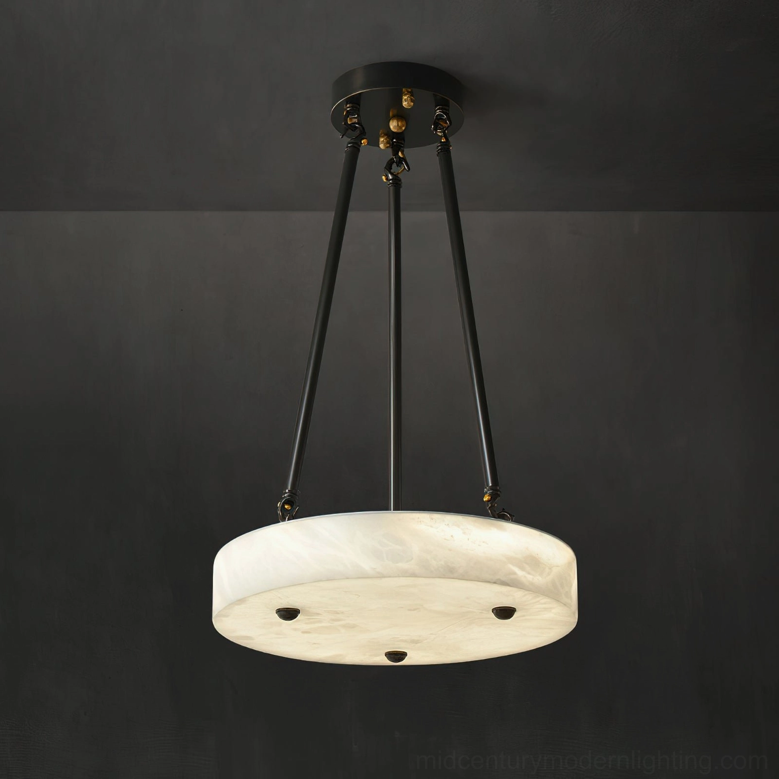 Understated luxury alabaster pendant lamp with brass tripod on dark gray background