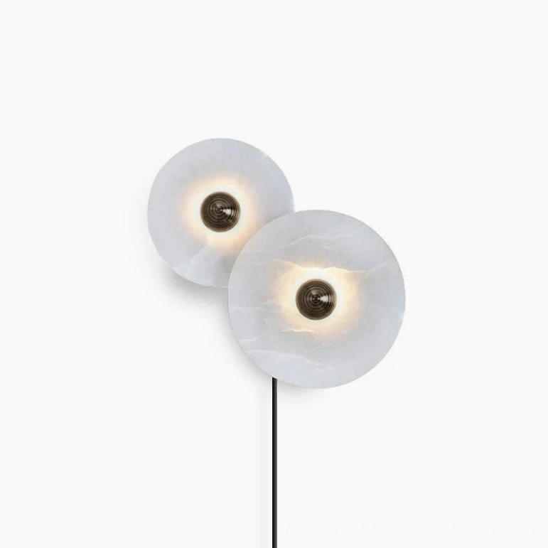 Dual-disc alabaster wall lamp with bronze central rod, symmetrical front view on white background