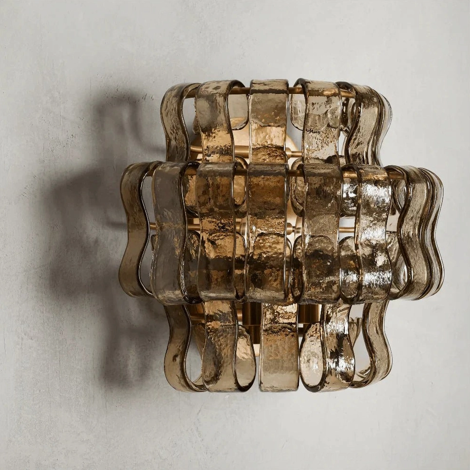 Albano wall sconce amber glass variant with warm light diffusion in bedroom setting