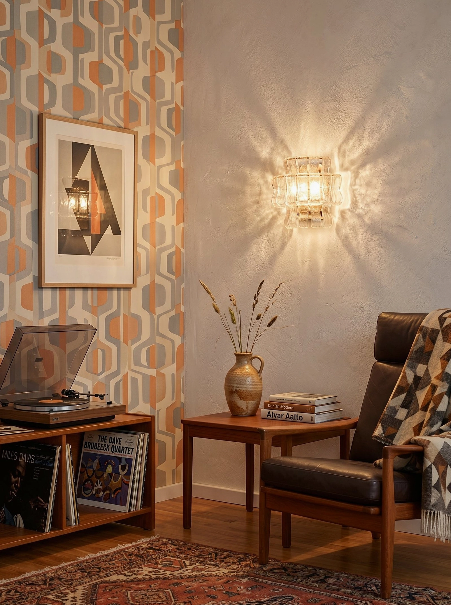 Albano wall sconce in cozy retro lounge with leather armchair and geometric wallpaper