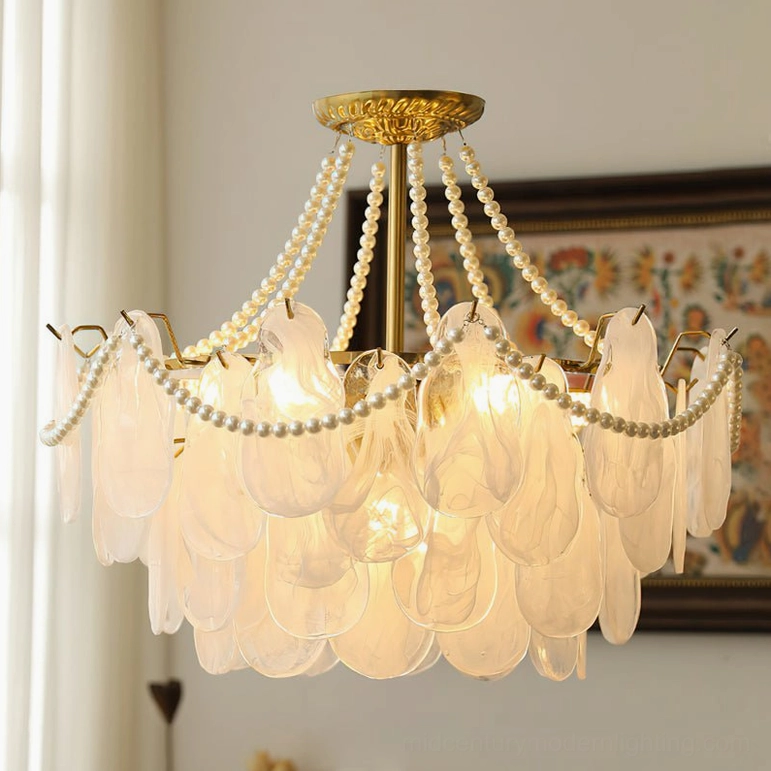 Large-scale frosted petal chandelier architectural statement piece luxury interior