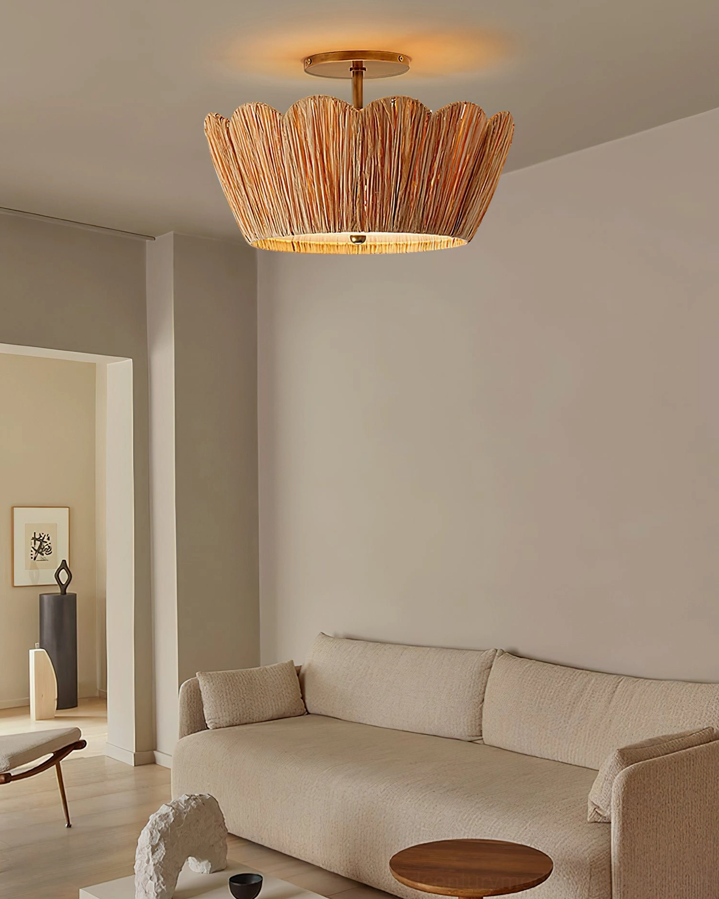 Alitzel natural raffia ceiling light above modern living room with sofa, understated bohemian decor