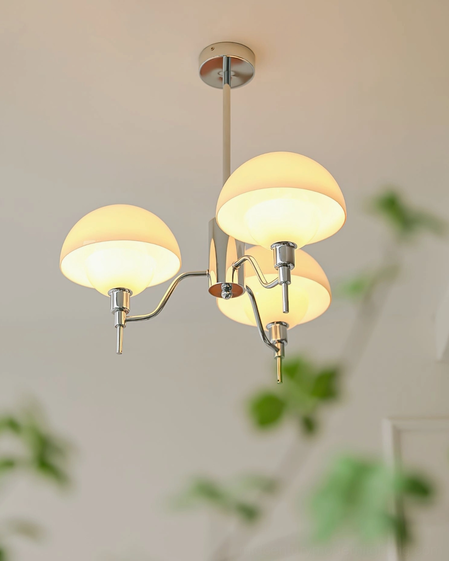 3-arm small ceiling chandelier angled close-up indoor home scene chrome frame large shades