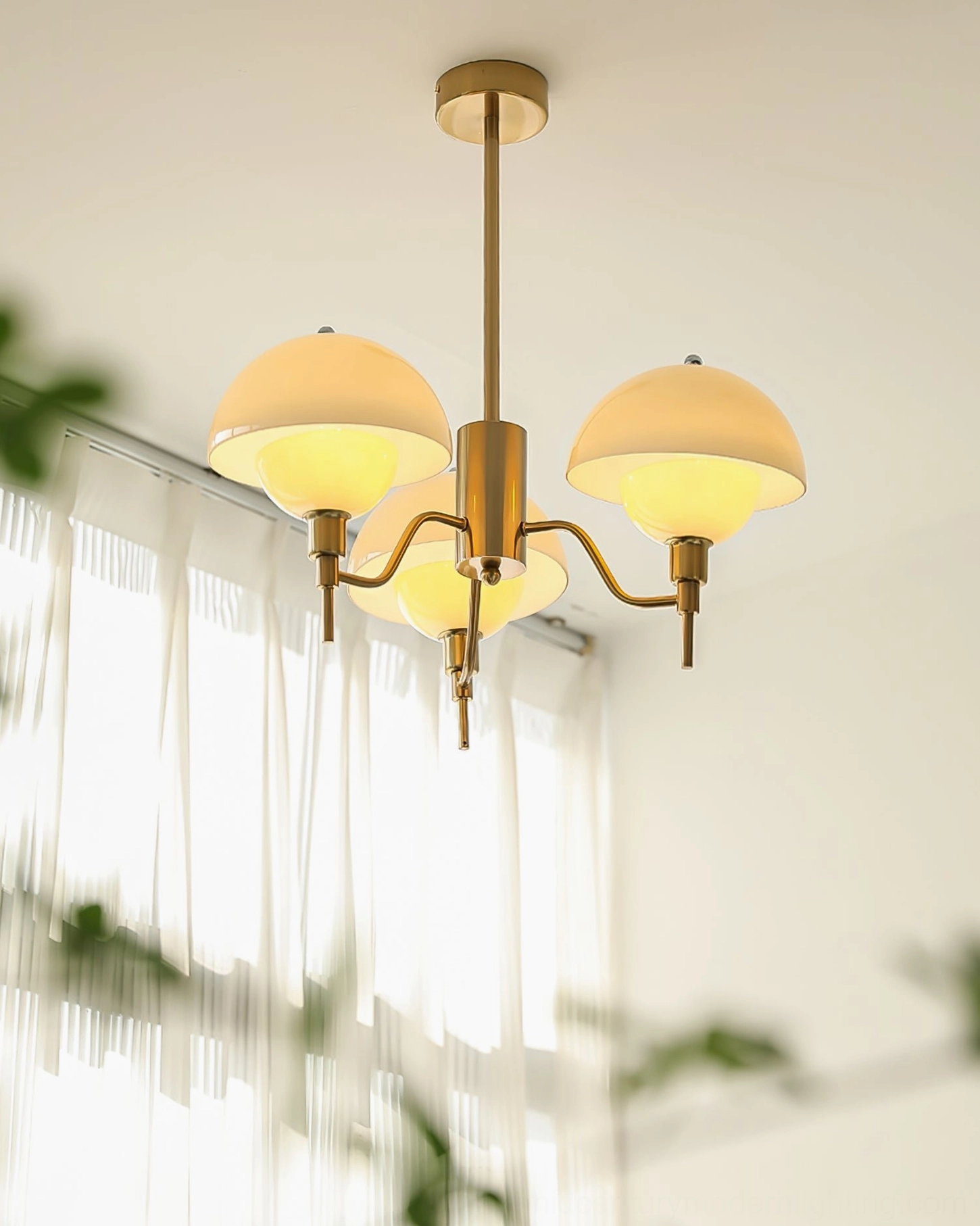 3-arm small ceiling chandelier bright room sheer curtains brass frame warm glass
