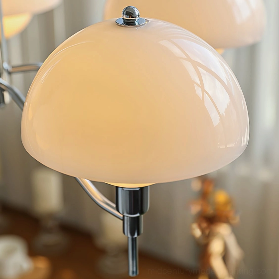 Single anchored orb glass shade close-up smooth milky white dome metal fixture
