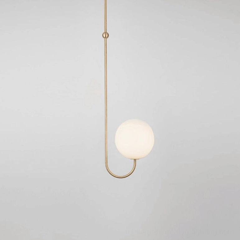 1-head single globe angle chandelier with polished brass and frosted white glass in minimalist setting