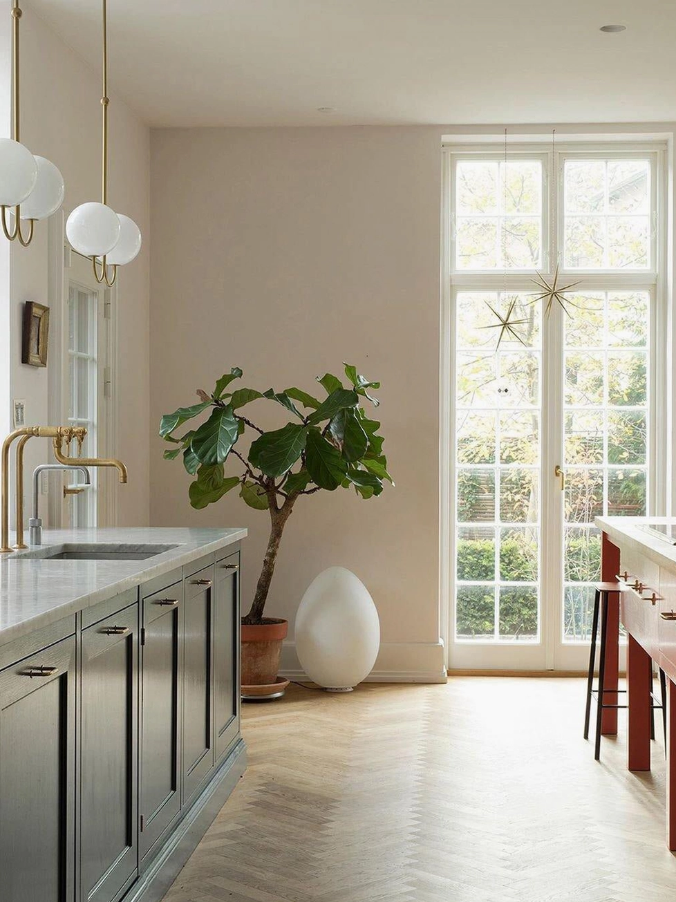 Single and multi-head angle chandelier configurations in modern interior design application