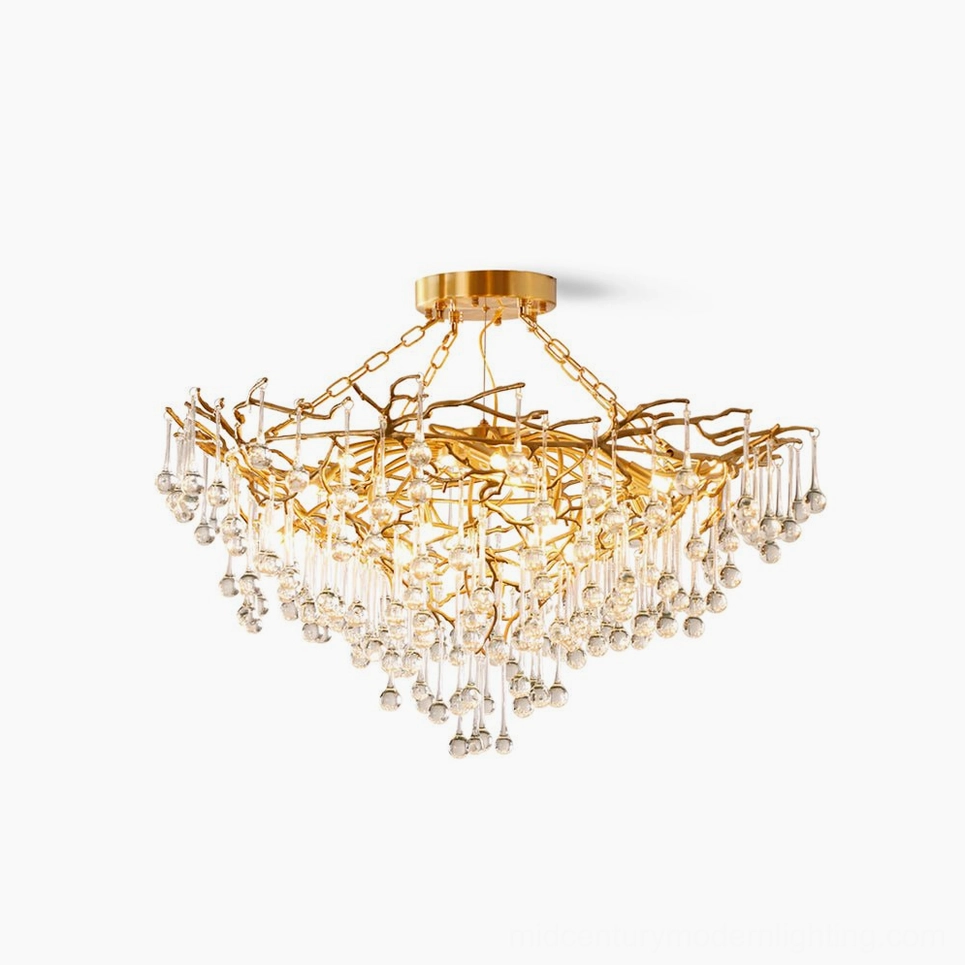 Anita gold leaf crystal chandelier with brass frame and clear crystal drops, frontal studio view