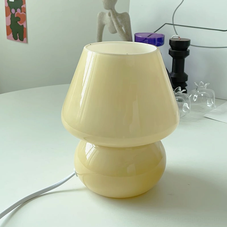 Ansel cream color handcrafted glass lamp showing textured surface and ambient glow