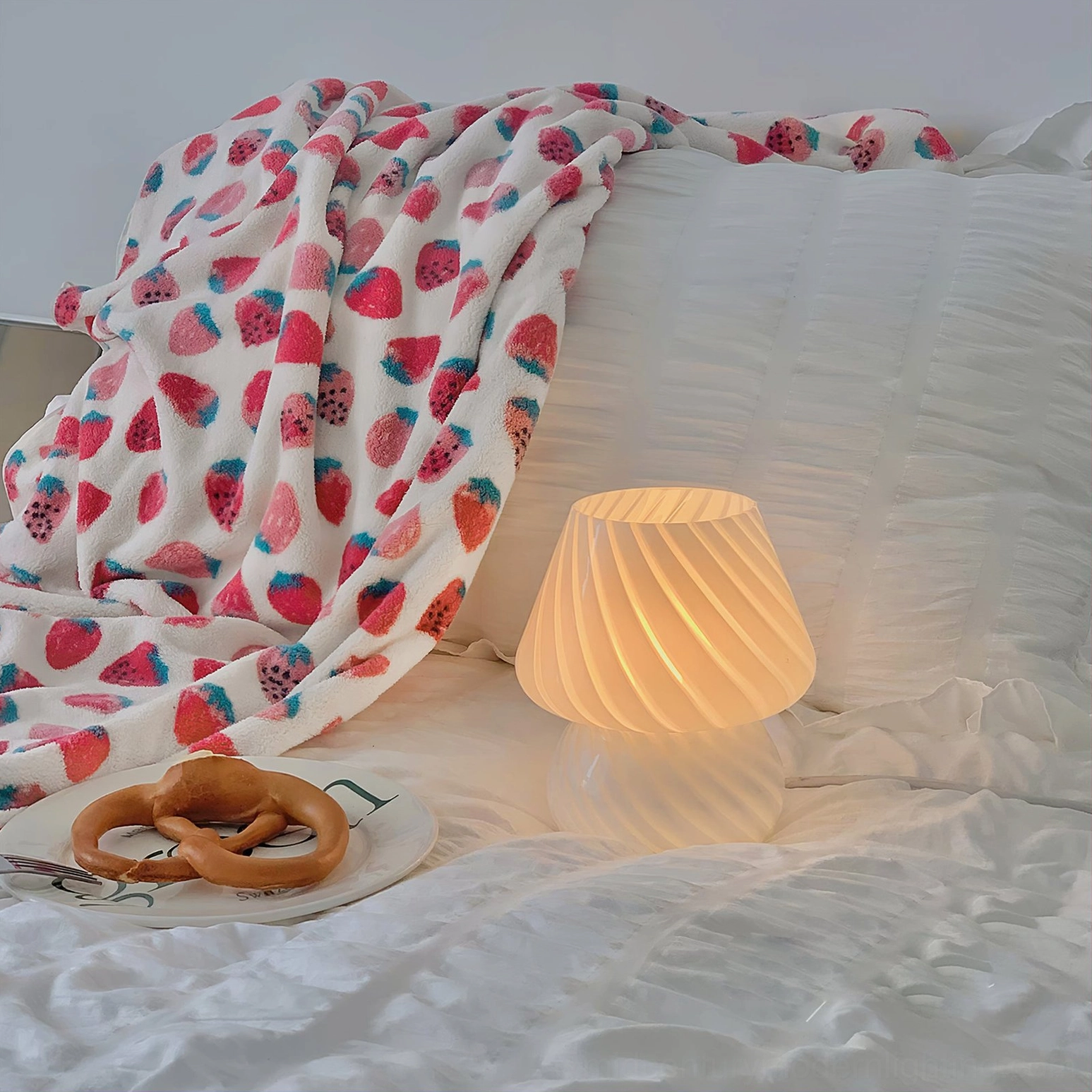 Ansel mushroom shaped glass lamp showing interior bulb socket and sculptural form design elements