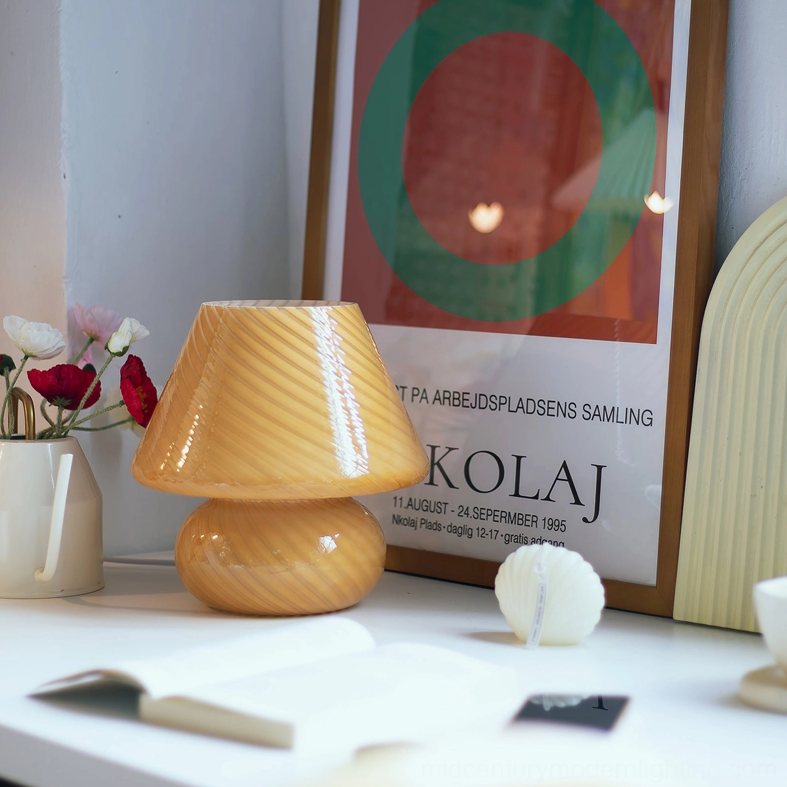 Ansel handcrafted glass mushroom lamp with warm ambient lighting in living room ambiance
