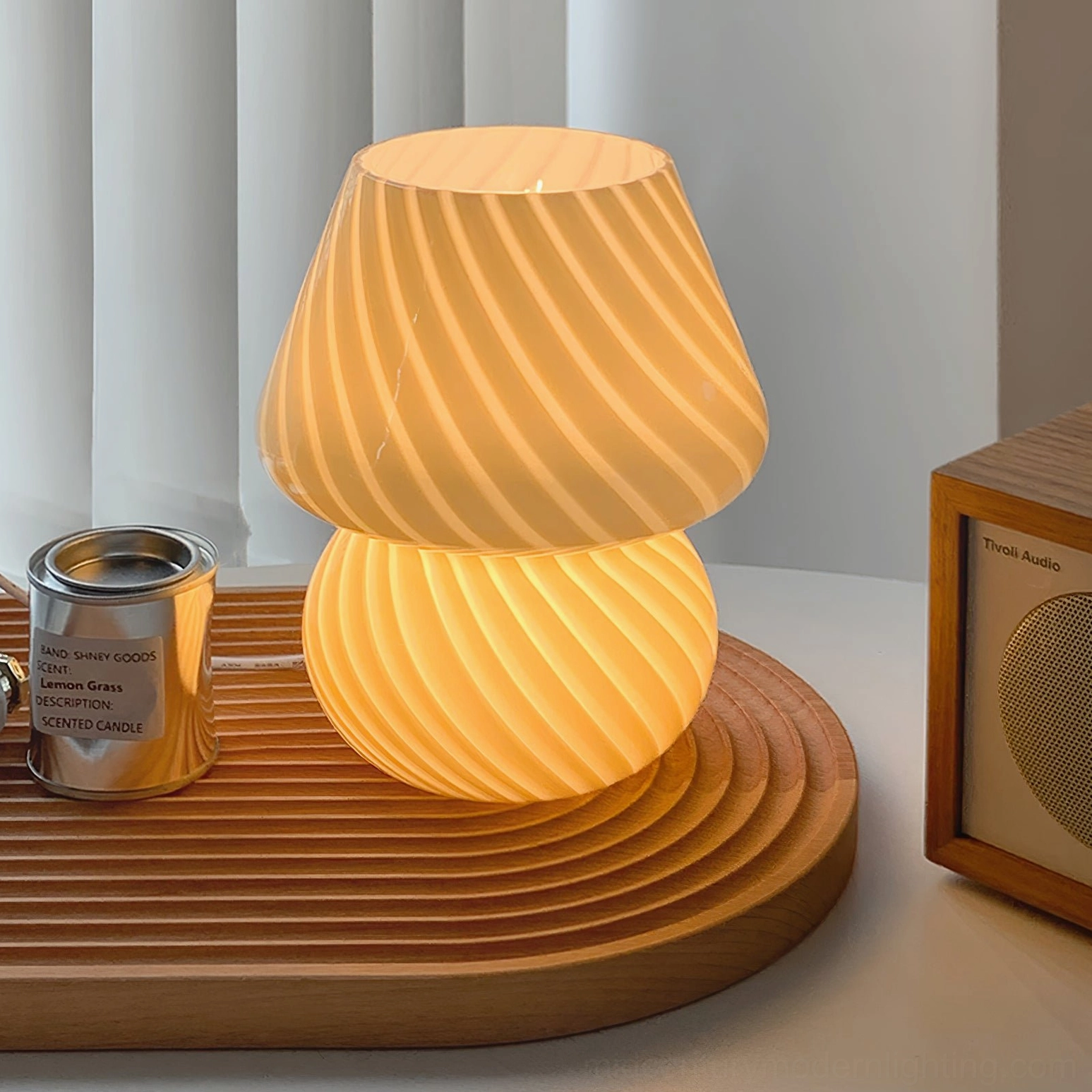 Ansel glass table lamp paired with mid-century modern furniture and vintage accessories