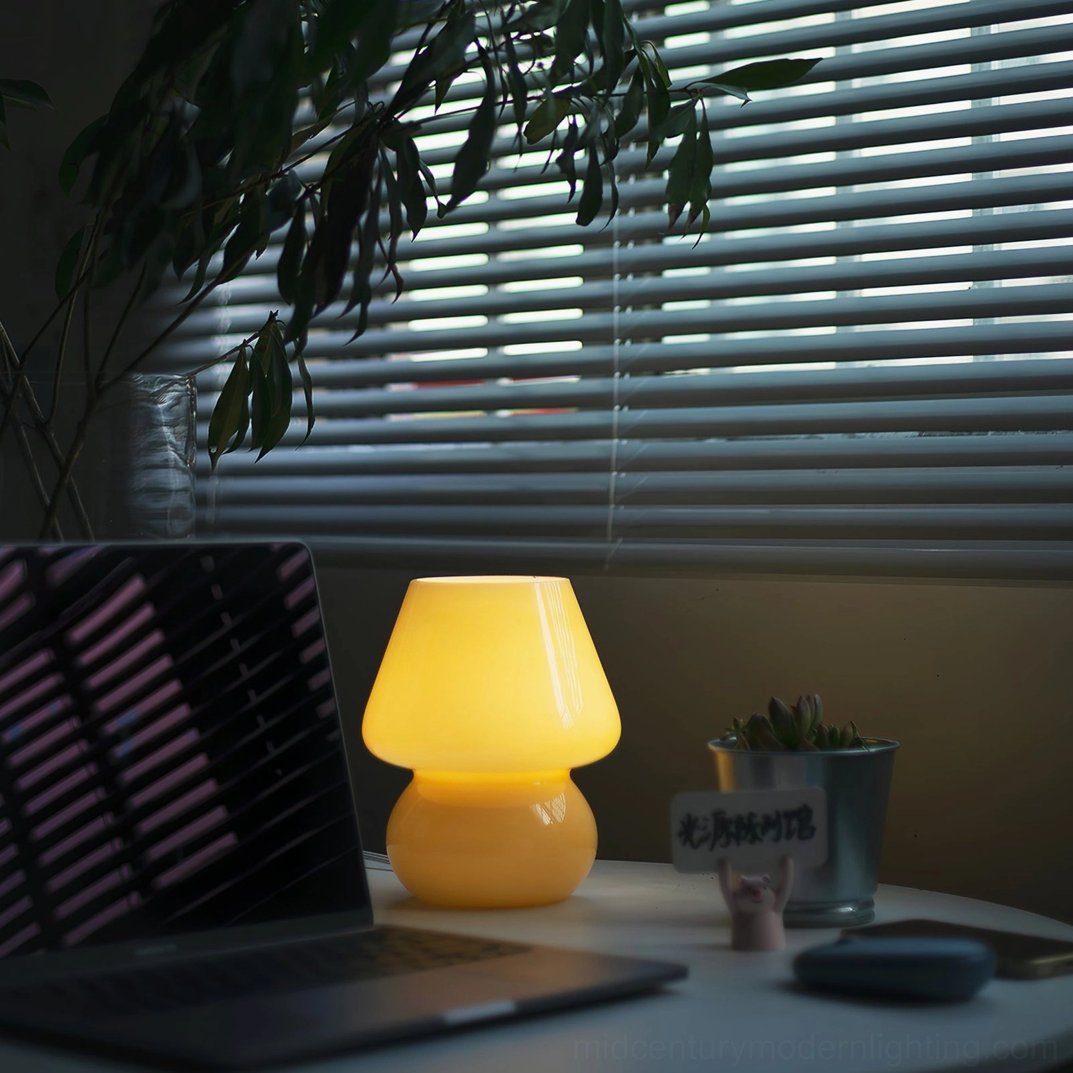 Ansel textured glass table lamp available in multiple color options display arrangement