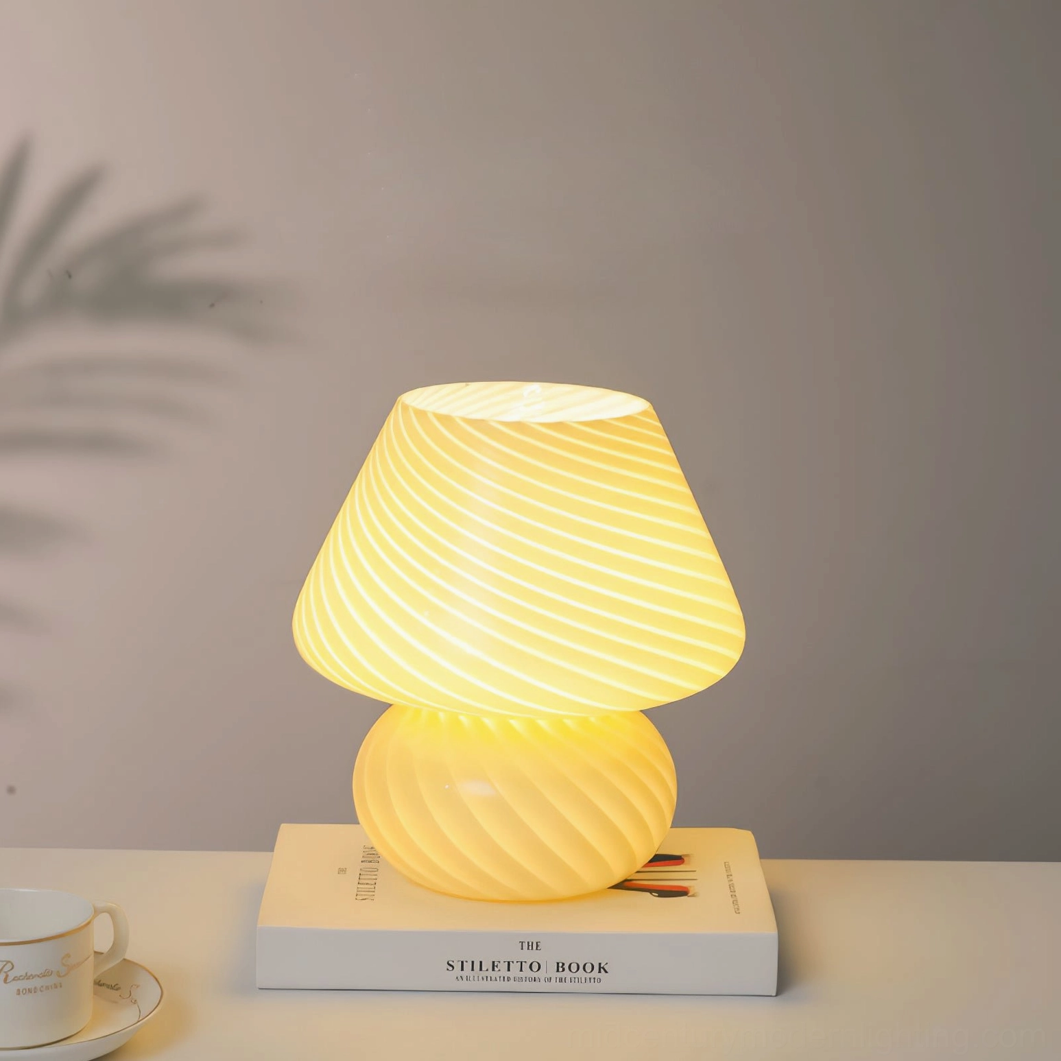 Ansel mid-century modern glass lamp with sculptural mushroom silhouette side view
