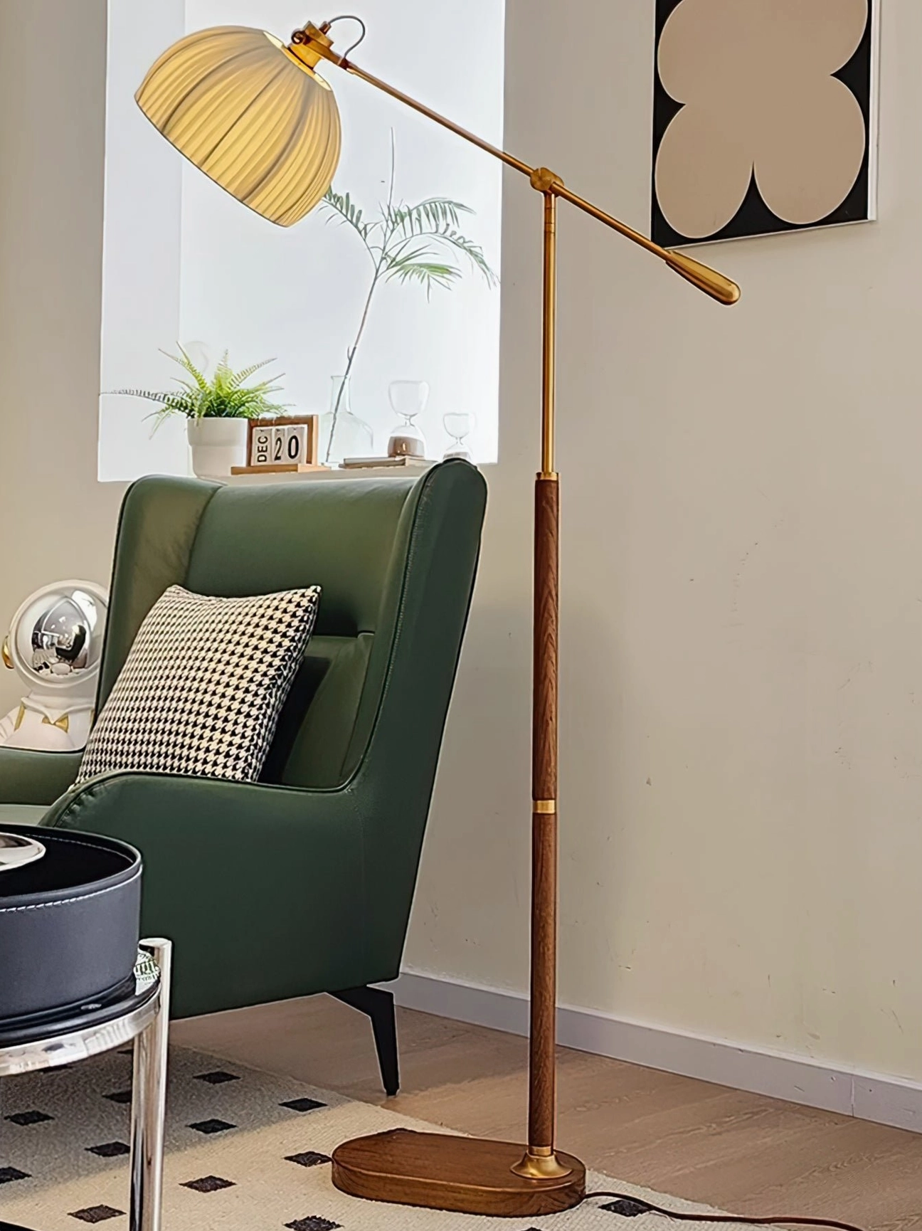 Mid-century adjustable floor lamp with articulated swing arm mechanism and pleated fabric dome shade, multiple finish options display