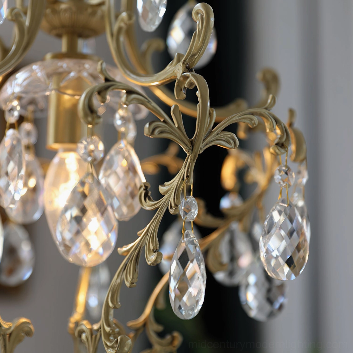 Antique brass birdcage pendant with crystal accents installed in interior ceiling lighting application