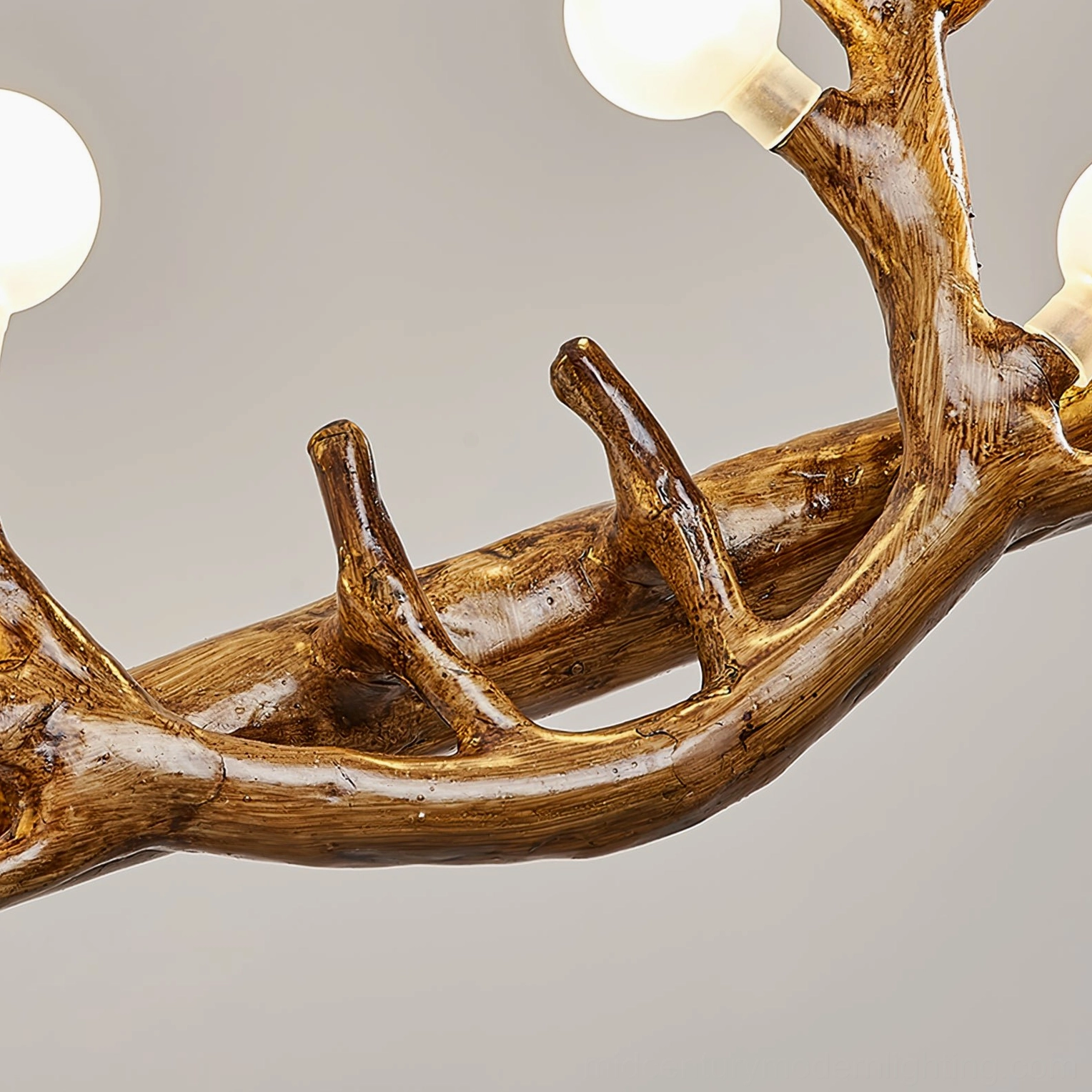 Close-up macro shot of antler chandelier frame showcasing realistic natural wood grain texture and branch details