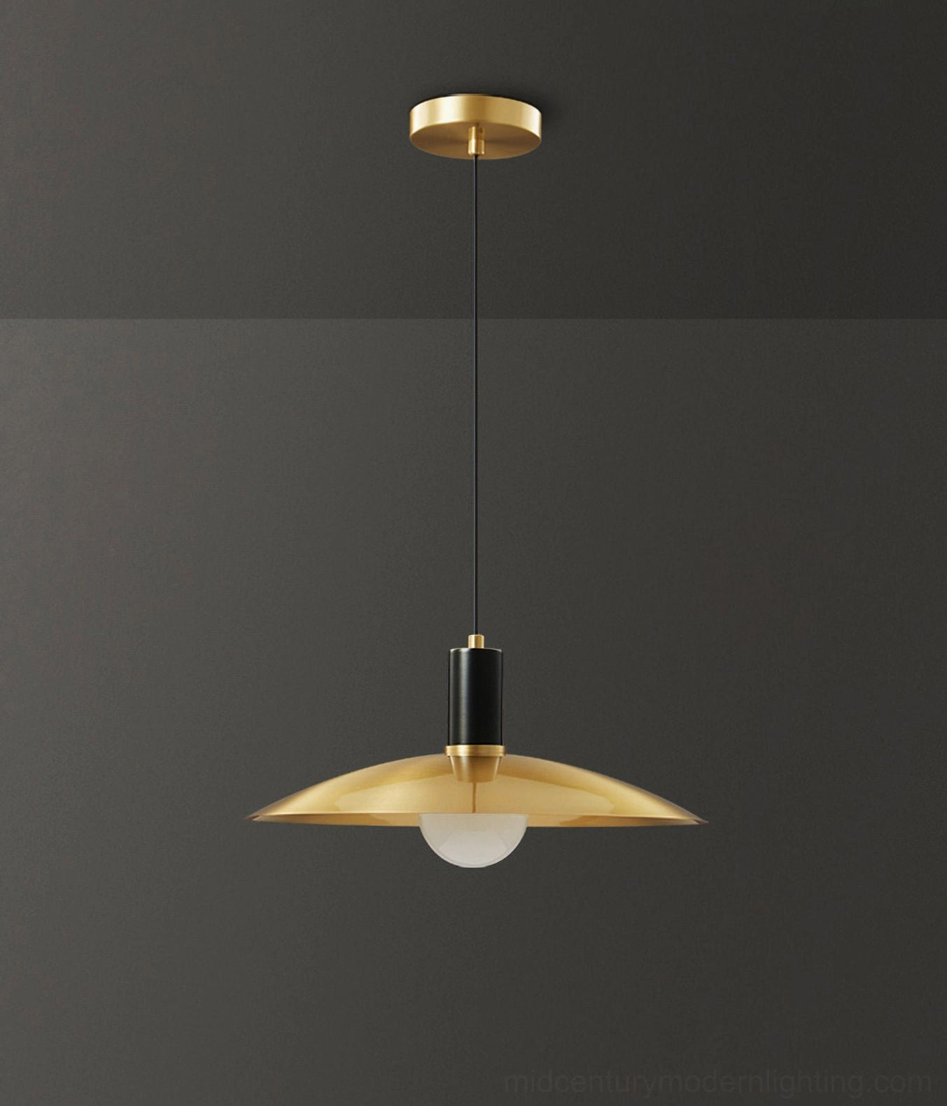 Aplomb brass pendant light close-up, precision engineered metal construction
