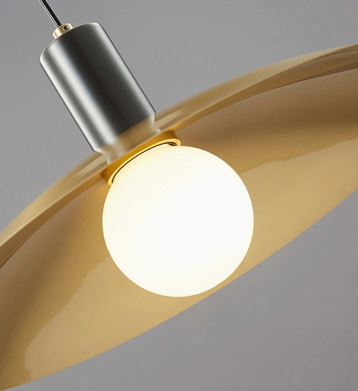Aplomb brass saucer pendant, elegant minimalist lighting solution