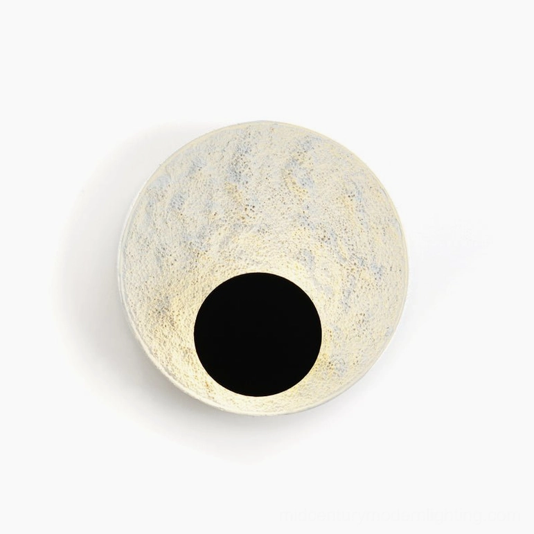 Apollo 19-6-inch statement wall lamp large textured lunar surface illuminated modern interior