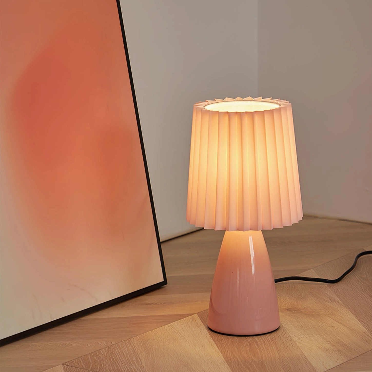Apollo table lamp sculptural ceramic base and pleated shade