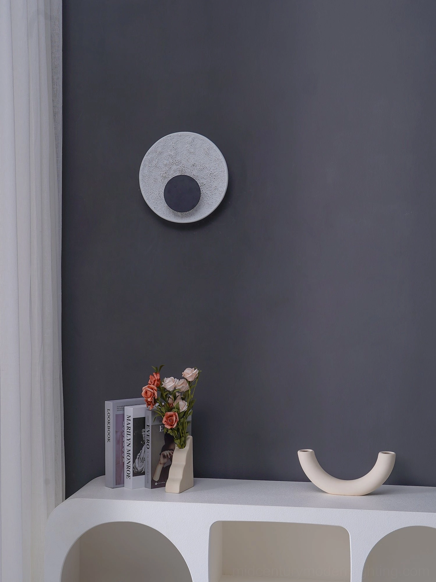 Apollo textured wall lamp profile detail shot monochrome finish architectural lighting