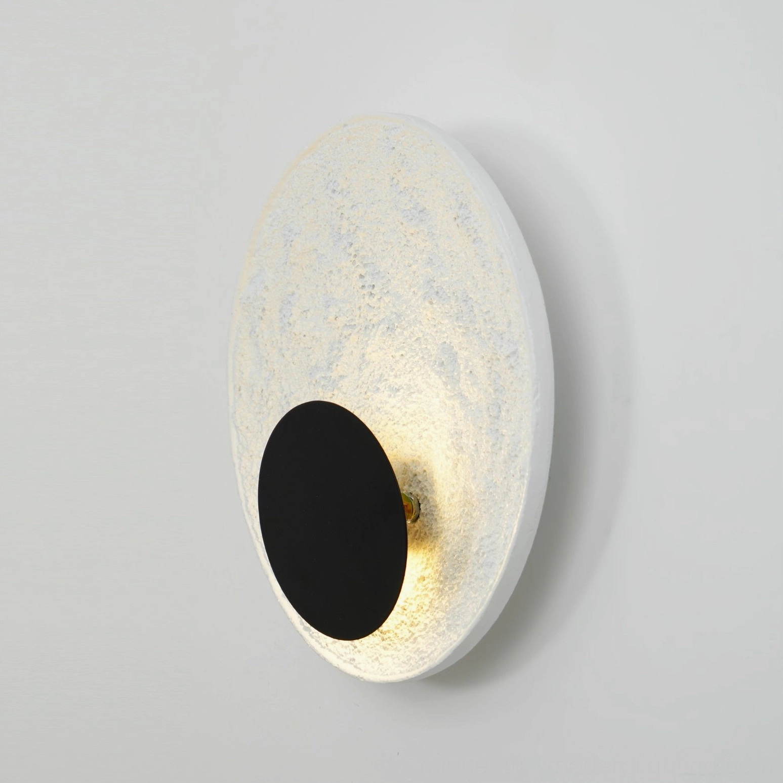 Apollo wall lamp illuminated side view warm accent lighting residential interior