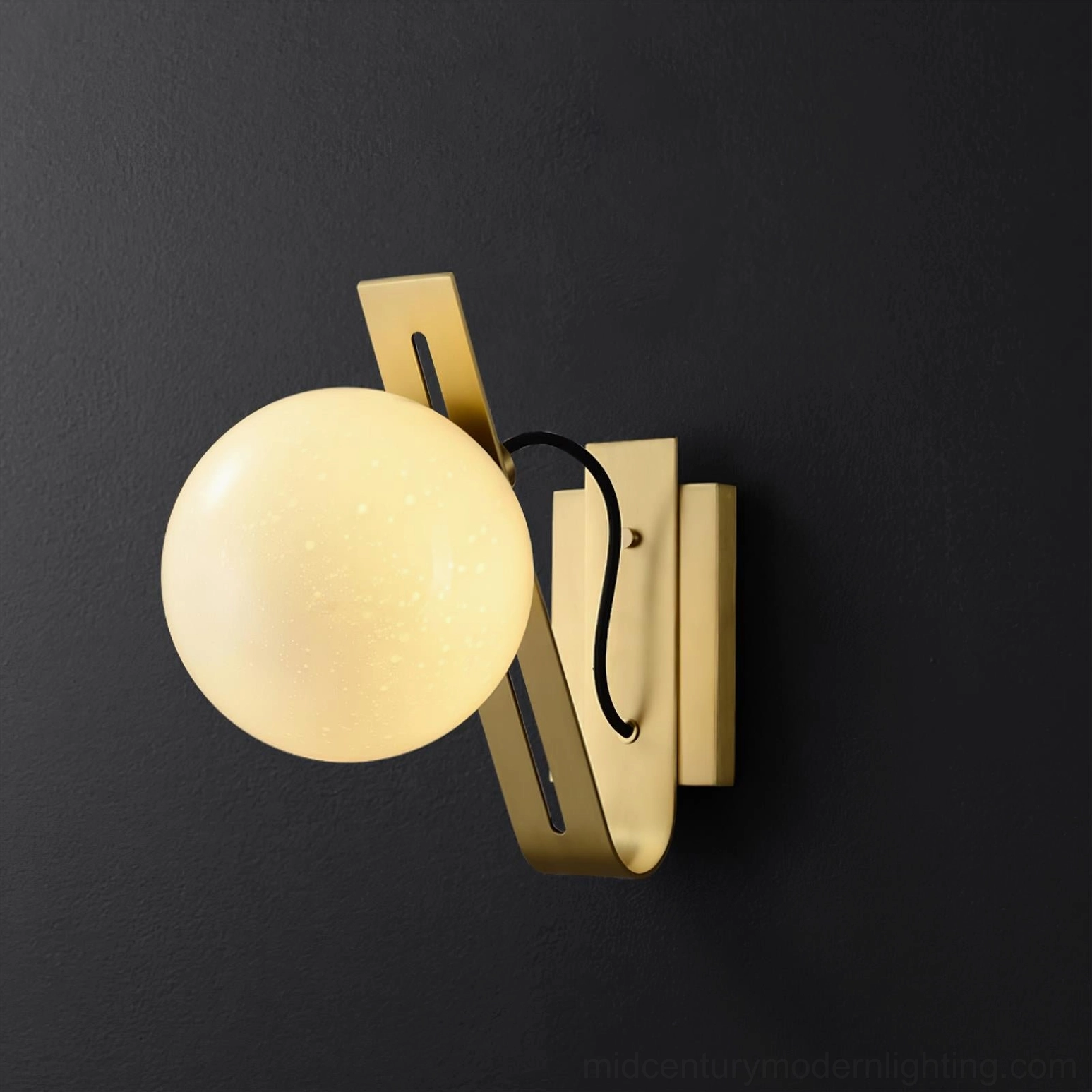 Blackened metal Arandela globe wall lamp paired with modern minimalist decor elements
