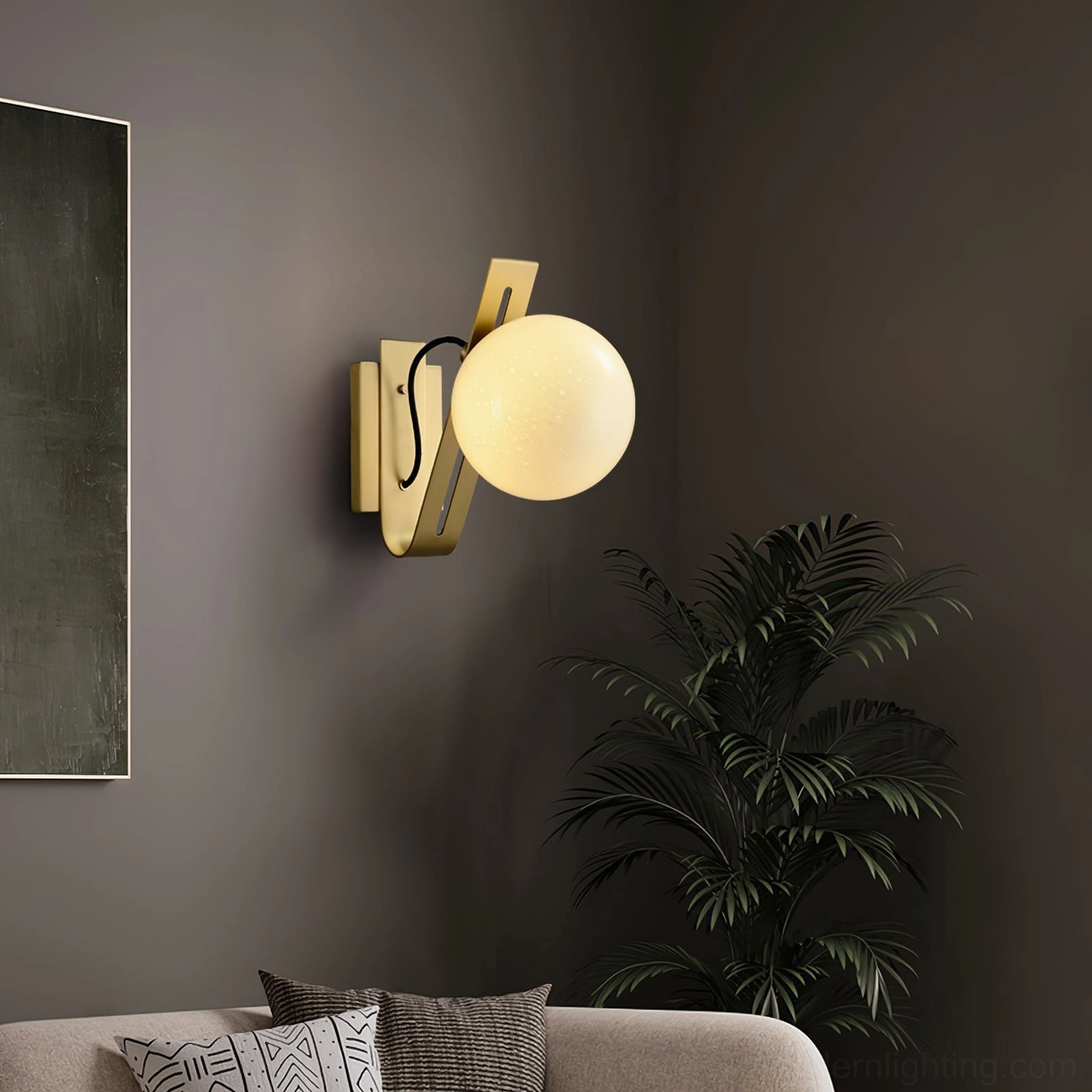 Arandela burnished brass and white globe wall sconce in contemporary interior design setting