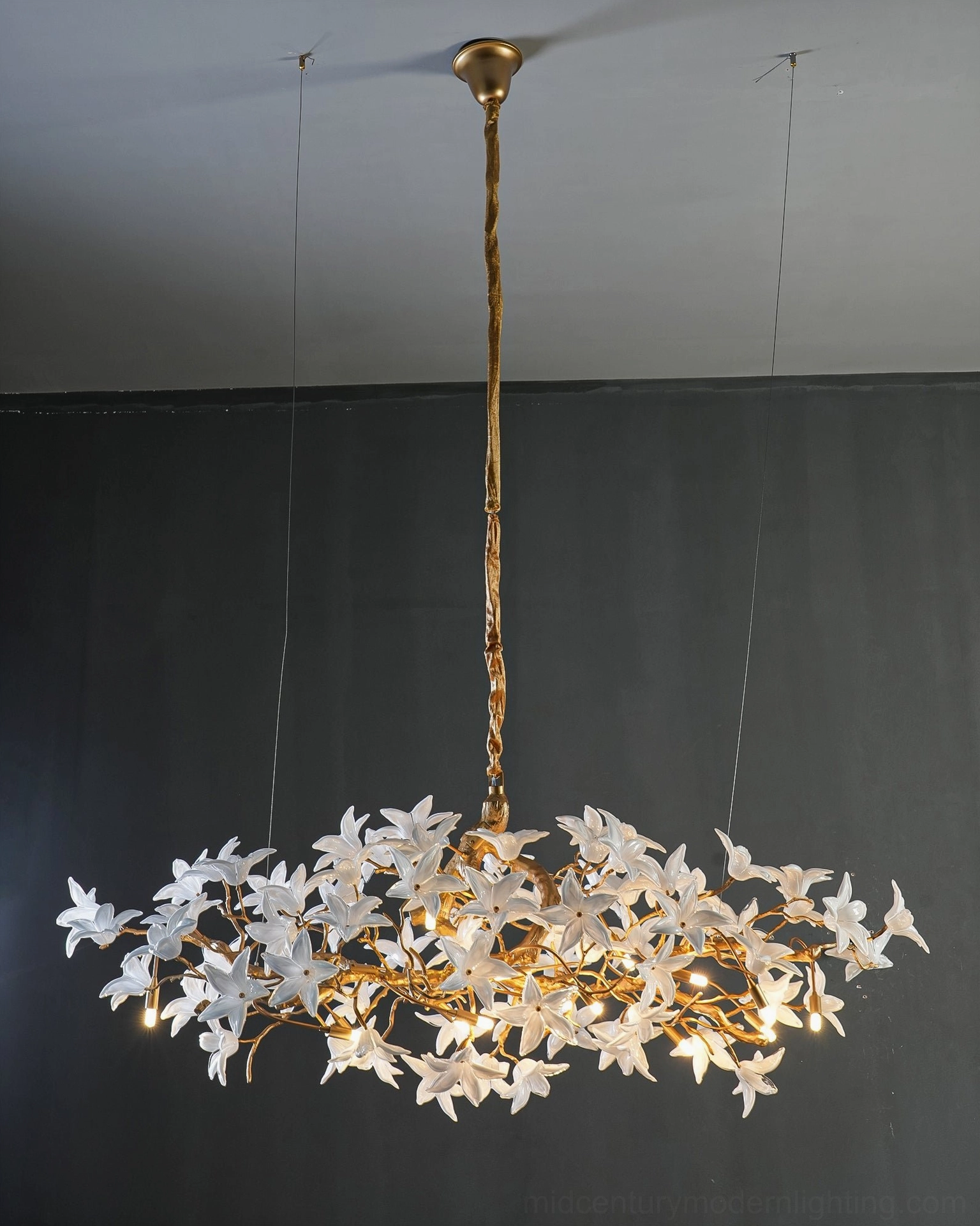 Arboris blossom branch chandelier ambient view showing light distribution and glass elements