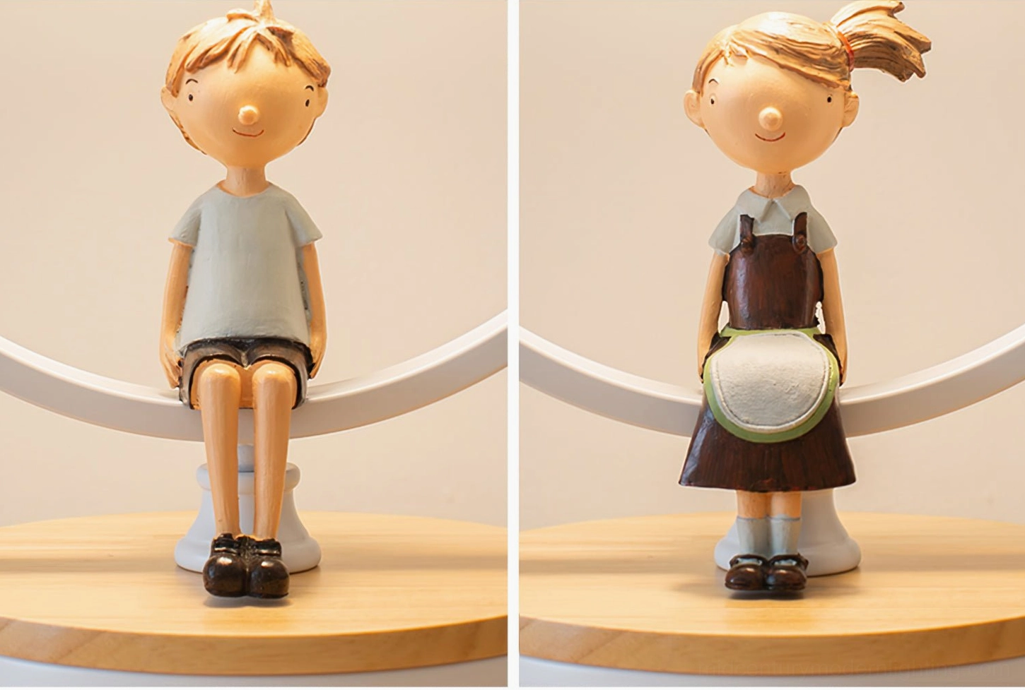 Decorative resin figurines accompanying arc floor lamp styling in contemporary interior vignette
