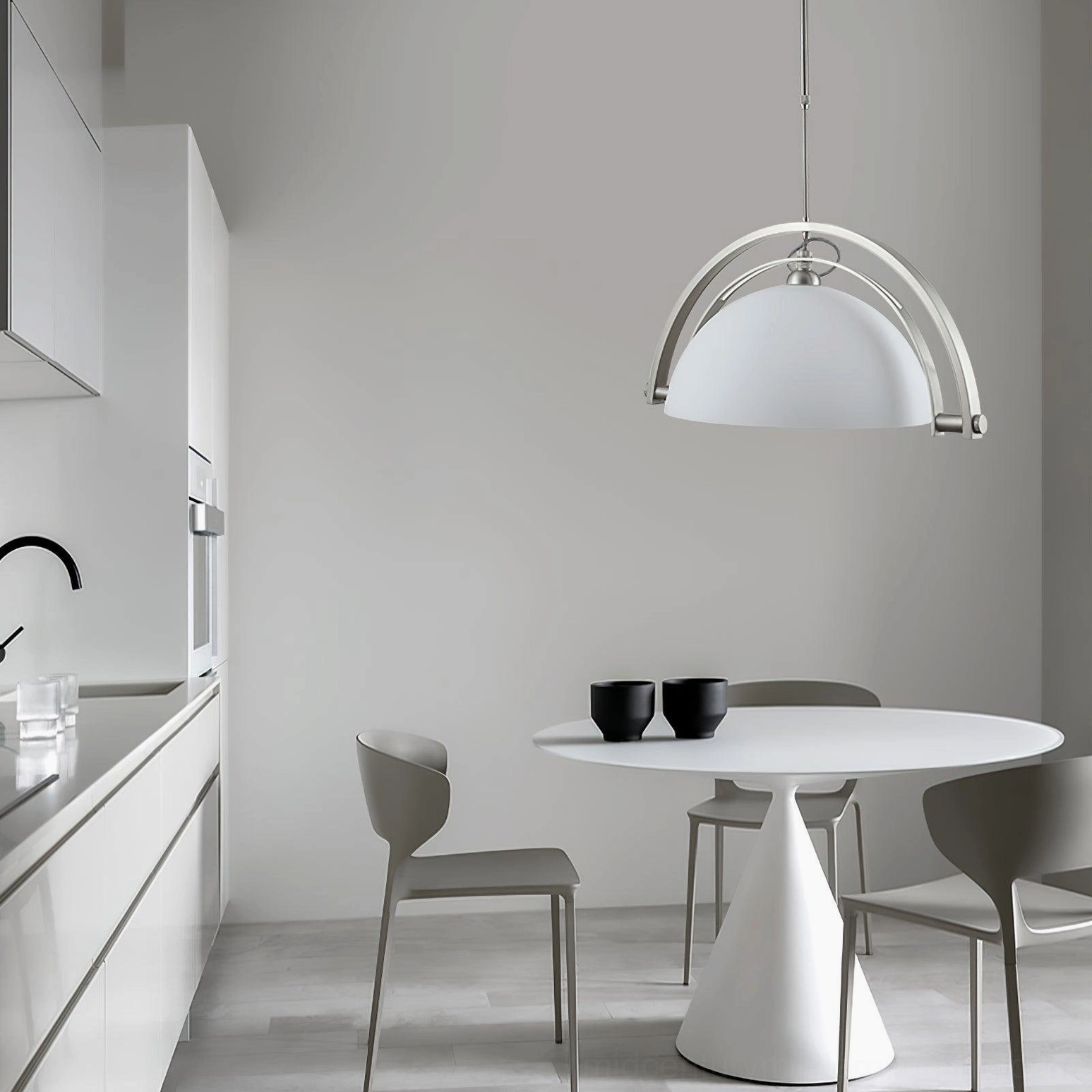 Arc pendant light in minimalist white dining room with Scandinavian modern home aesthetic and contemporary design